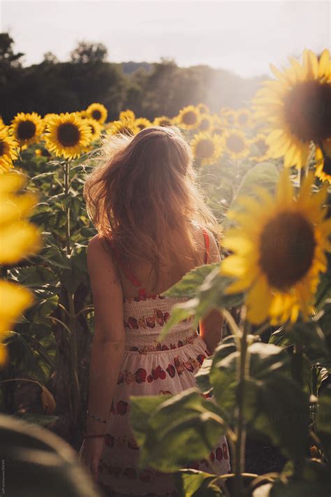 Girl In A Sunflower Field By Stocksy Contributor Paff Stocksy