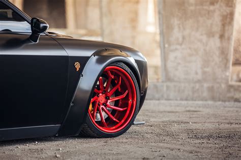Blacked Out And Stanced Dodge Challenger Srt Benefits From Custom Red