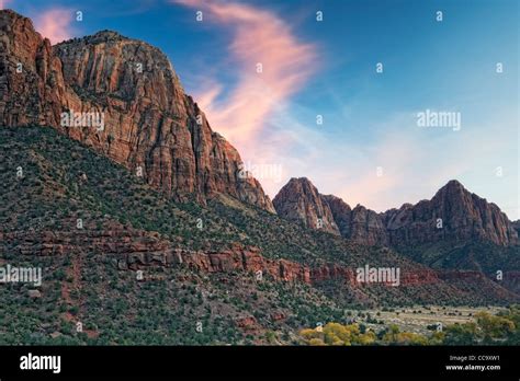 Autumn Sunset Over Zion Canyon As The Watchman Spire Overlooks The