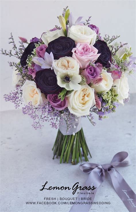 Pale pink summer wedding bouquets. White garden roses, lavender roses, deep purple roses ...