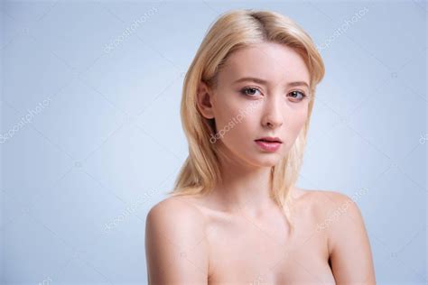 Serious Woman Standing Naked In Salon Stock Photo Yacobchuk