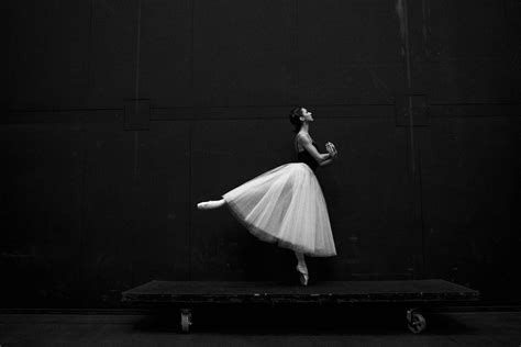 Download Ballet Dancer On Trolley Wallpaper