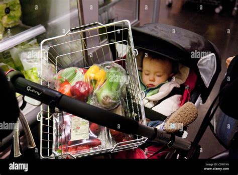 Baby Asleep In Pram Hi Res Stock Photography And Images Alamy
