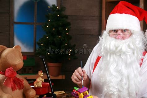 Santa Makes Toys In His Workshop Stock Photo Image Of T Pedal