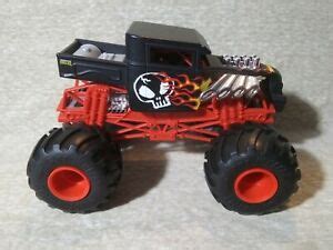 A Hot Wheels Big Monster Jam Bone Shaker Red Black Skulls