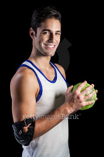 Portrait Of Happy Athlete Man Holding A Ball 이미지 660792522 게티이미지뱅크