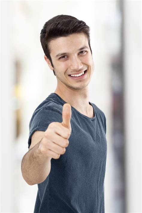 Young Man Showing Ok Sign With His Thumb Up Stock Photo Image Of Sign