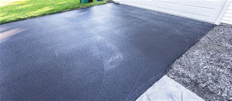 This product contains an asphalt resin that can be applied without heat. Driveway Sealing: Should I Do It Myself? | Economy Paving