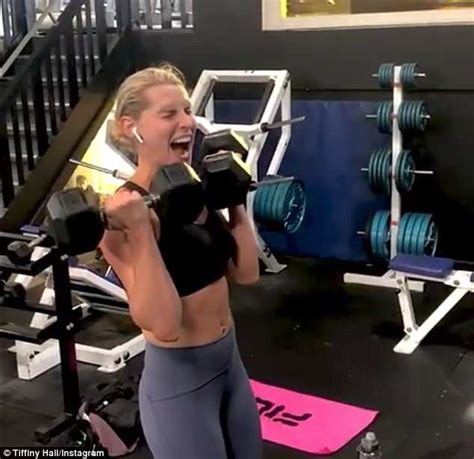 fitness guru tiffiny hall shows off her rock hard abs and toned derrière during epic workout