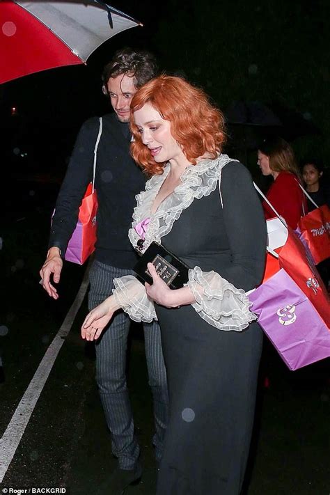 Christina Hendricks Stuns In A Plunging Black Lace Dress As She Attends