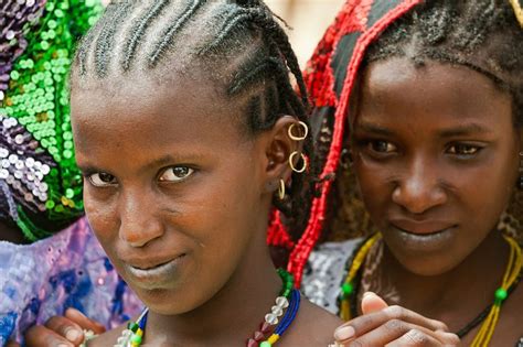 Portrait Of Two Fulani Girls Dressed In Colorful