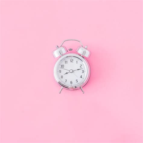 Premium Photo Alarm Clock On Pink Background