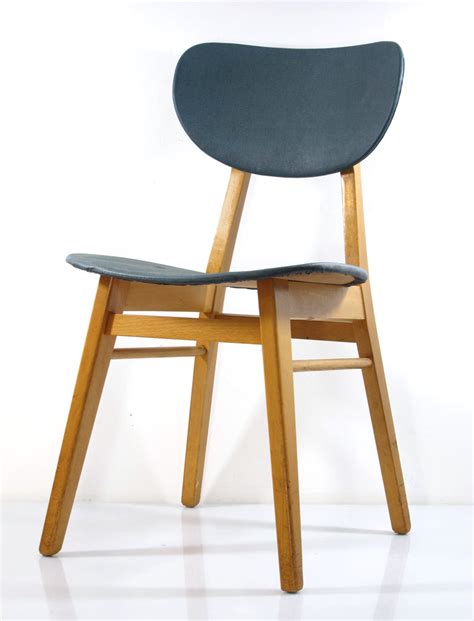 Great savings & free delivery / collection on many items. 2 fifties design wooden dining chairs, vintage retro design