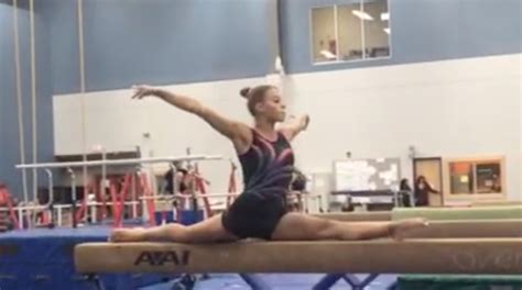 gymnast marisa dick invents a new move on the balance beam