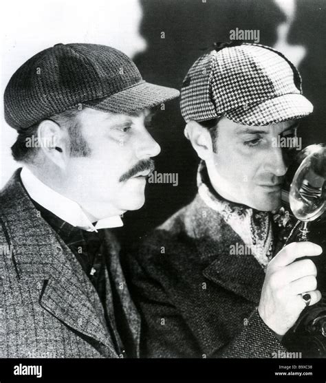 Sherlock Holmes Nigel Bruce Als Dr Watson Und Basil Rathbone Als Holmes Links Stockfotografie