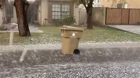 Major Hail Storm Pushes Trash Can Down The Street In Amusing Video