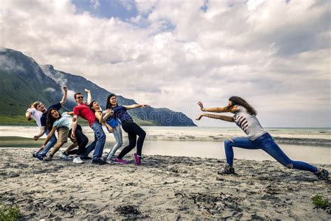 Group Of People Having Fun On The Beach Of Norway Stock Image Image