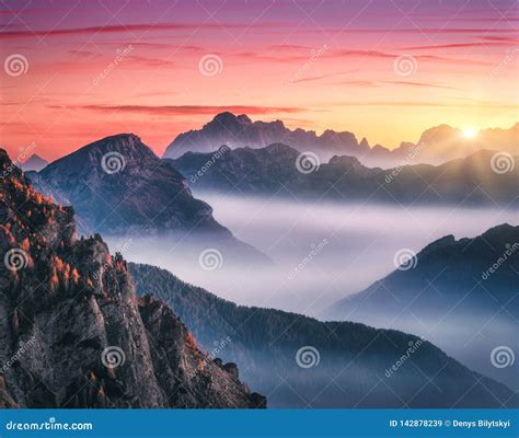 Mountains In Fog At Beautiful Sunset In Autumn Stock Image Image Of