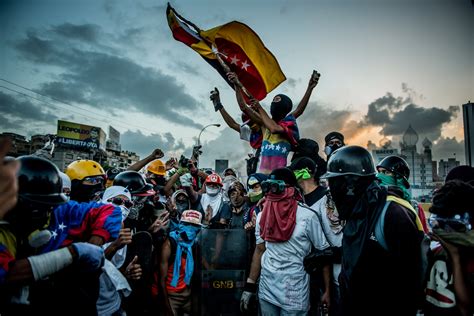 The Battle For Venezuela Through A Lens Helmet And Gas Mask The New