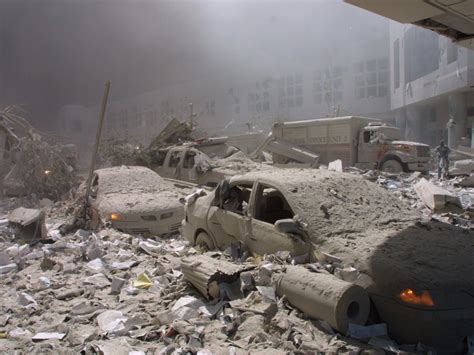 20 Haunting Photos From The September 11 Attacks That Americans Will