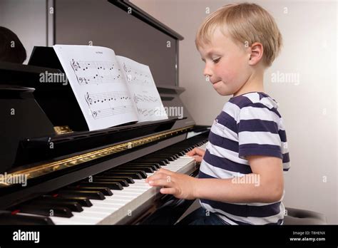 Child Playing Piano Hi Res Stock Photography And Images Alamy