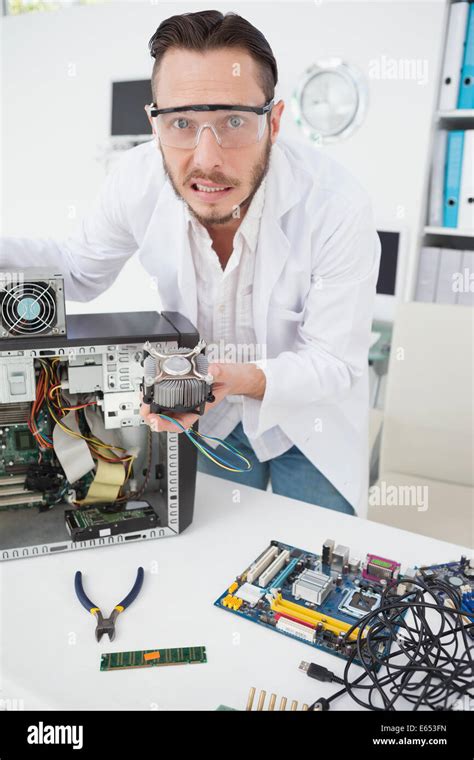 Stressed Computer Engineer Showing Broken Fan Stock Photo Alamy