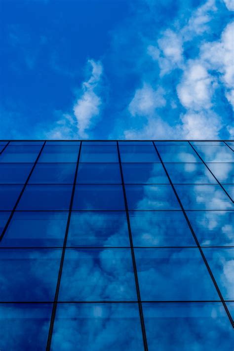Download Wallpaper 800x1200 Building Glass Clouds Reflection Iphone