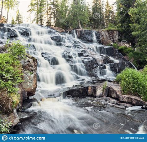 Mountain Waterfall In The Dense Forest Sweden Stock Photo