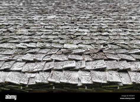 Old And Weathered Wooden Roof Shingle Blurred Texture And Background