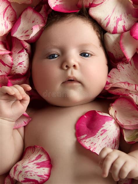 Portrait Of A Beautiful Little Baby Girl With Pink Flowers Healthy