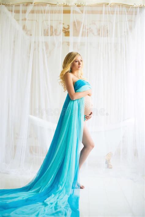Beautiful Pregnant Woman Attractive Blonde Touching Naked Belly Posing