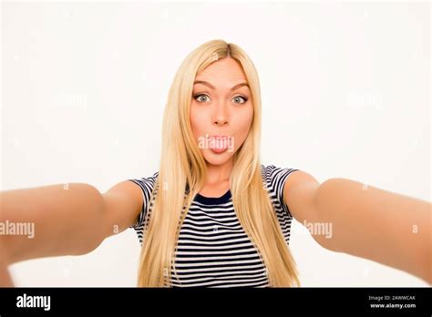 Funny Woman Making Comic Selfie And Showing Tongue Stock Photo Alamy