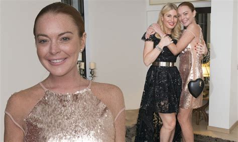 Underwear Free Lindsay Lohan Dazzles In A Thigh Skimming Gold Dress As She Celebrates Socialite
