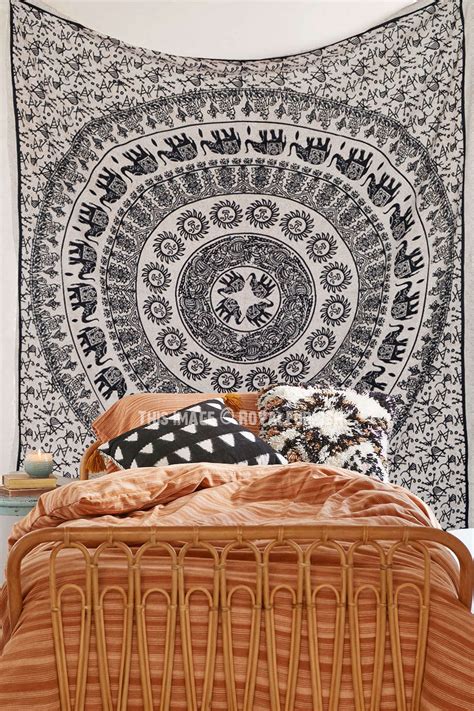 Accent your home with simple touches that can bring out the most in your space. Black and Beige Sun Moon & Elephants Ring Mandala Tapestry ...