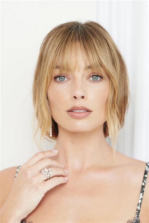 How Margot Robbie Got Ready For The 2021 Oscars From Fresh Bangs To