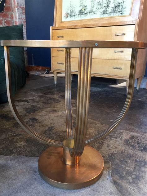 Coffee tables have a prominent place and function in a living room. French Art Deco Coffee Table, Attributed to Jean Michel ...