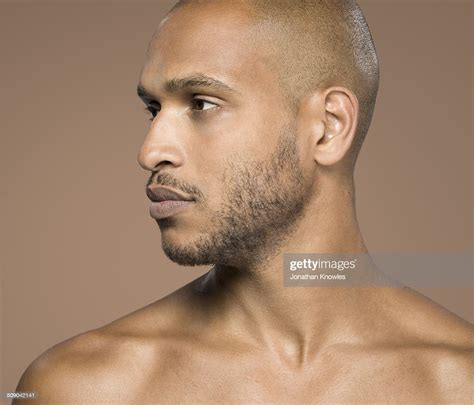 Portrait Of A Dark Skinned Male Looking Away Photo Getty Images