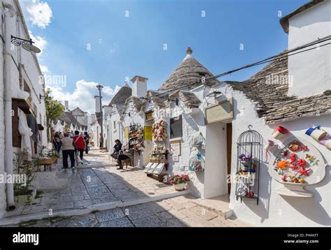 View Of The Typical Trulli Huts And The Alleys Of The Old Village Of