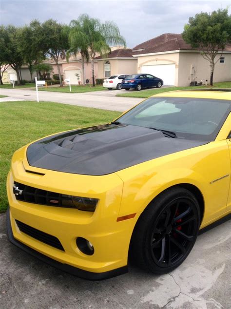 I like the look of carbon fiber hoods on some cars. Carbon Fiber Hood - Camaro5 Chevy Camaro Forum / Camaro ...