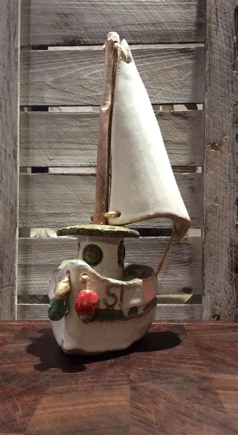 Made in maine with premium marine materials and strong reinforced fiberglass hull, these window box style boat planters have a flat back to hang under windows or on the wall. A ceramic sailing fishing boat by LeePoverCoastalArtist ...