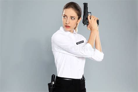 Female Security Guard In Uniform With Gun Stock Image Image Of Person