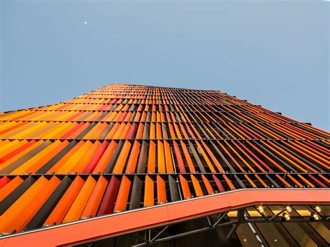 Architects Design Stunning Orange Facade Utilizing Lumiflon Enriched