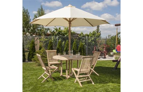 Wooden tables and chairs, wooden multifunctional furniture, wooden garden furniture. Set of garden furniture: table, 4 chairs and umbrella