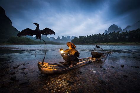 Fisherman Of Li River River Guangxi Mountain River