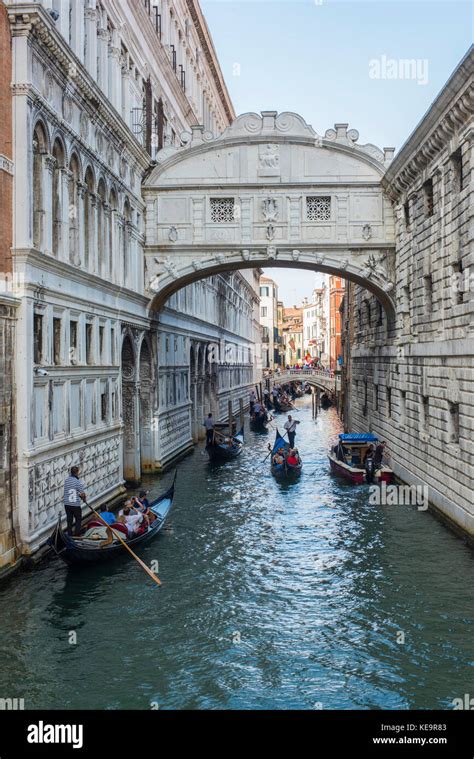 Gondolas Passing Under The Bridge Of Sighs On Rio Canonica Palazzo