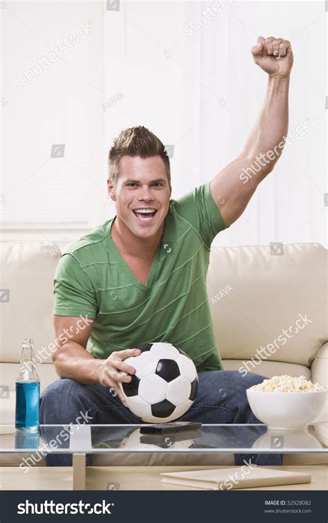 Attractive Young Man Holding Soccer Ball Stock Photo 32928082