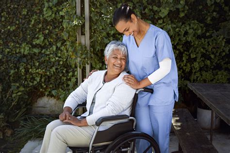 Nurse Takes Care Of Old Patient Stock Photo Download Image Now