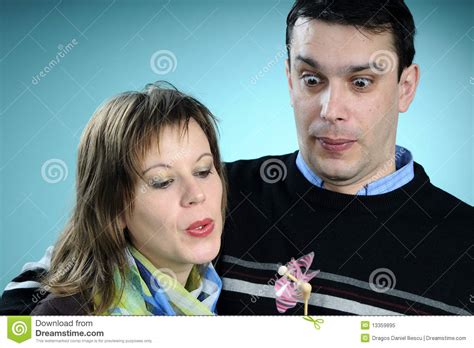 white couple blowing stock image image of female people 13359895