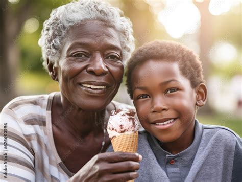 Close Up Portrait Of A Black Grandmother And Babe Grandson Eating Ice Cream Cones They Are