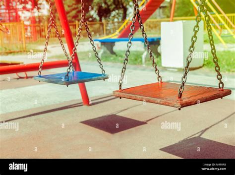 Empty Chain Swing In Playground Close Stock Photo Alamy